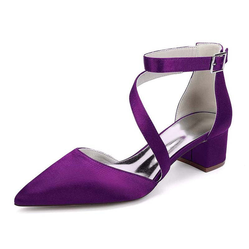Purple high-heeled shoe with a strappy design on a white background