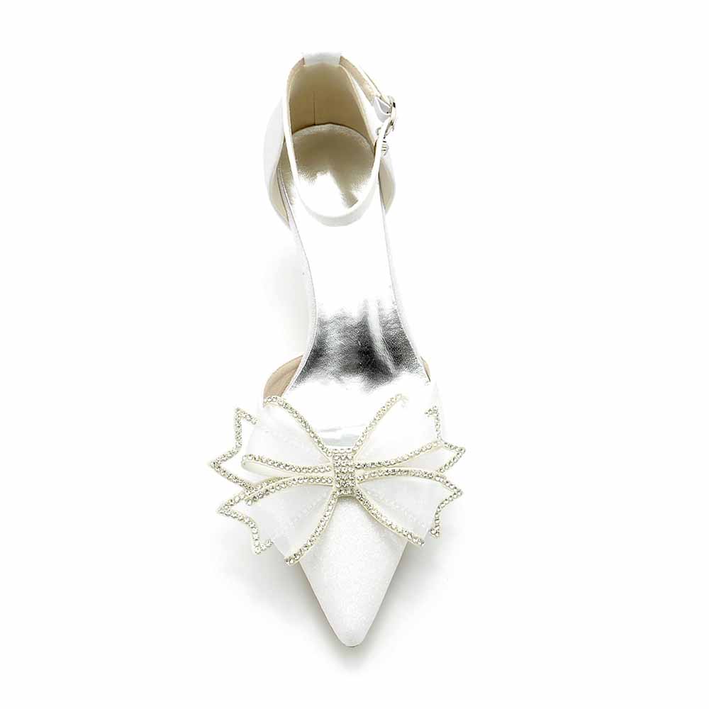 Elegant glitter bridal shoes low heel with a stunning bow design for weddings and special occasions