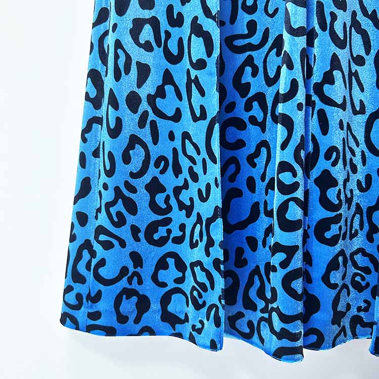 Stylish women's leopard print velvet pantsuit in vibrant blue tones, perfect for chic occasions