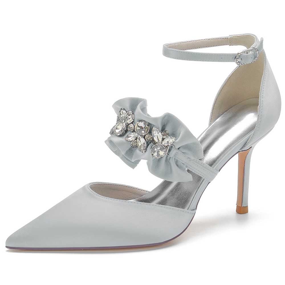 Elegant beaded pointed toe pumps in light blue with ruffle detail and ankle strap for stylish occasions
