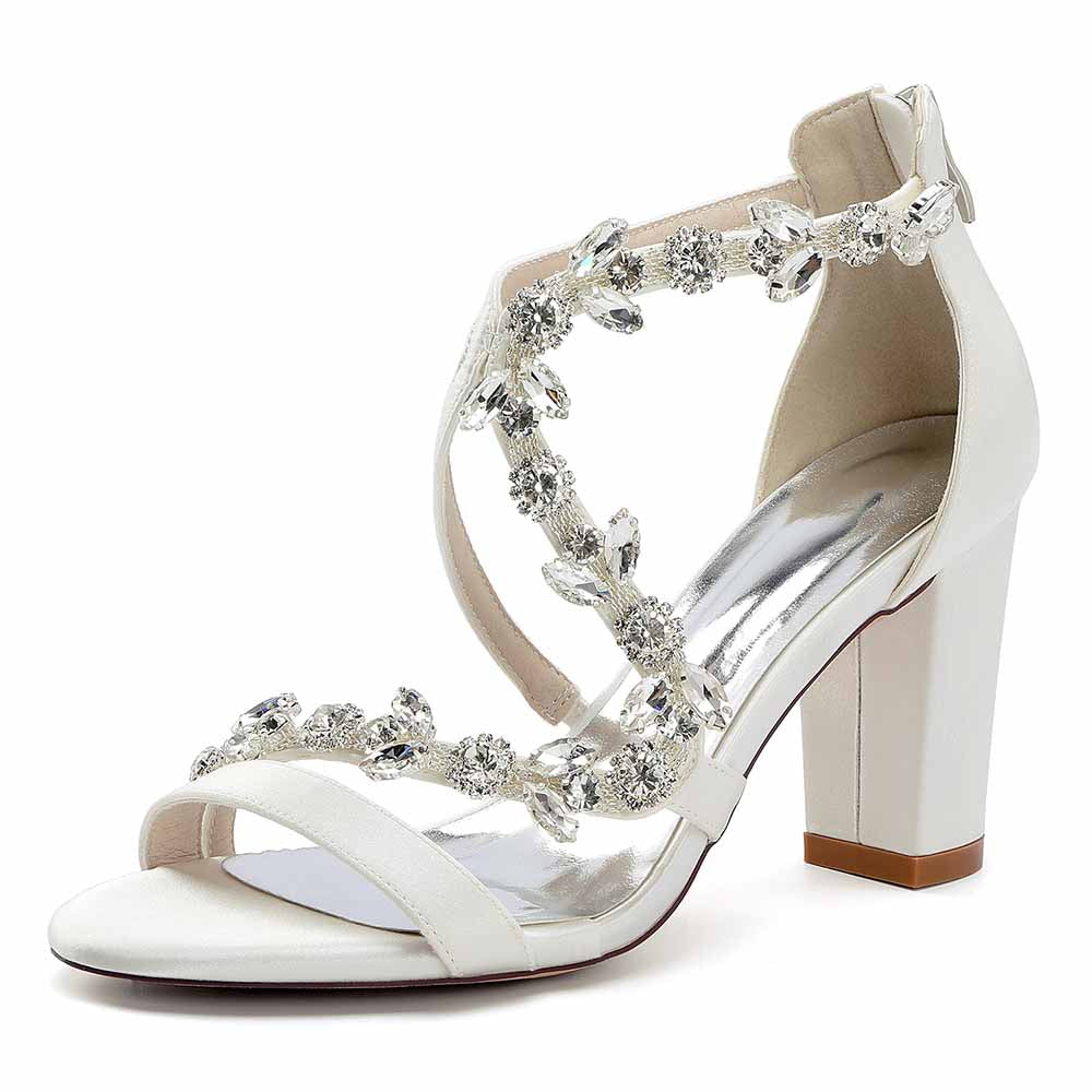 Elegant white crystal strappy wedding heels featuring a block heel and embellished straps