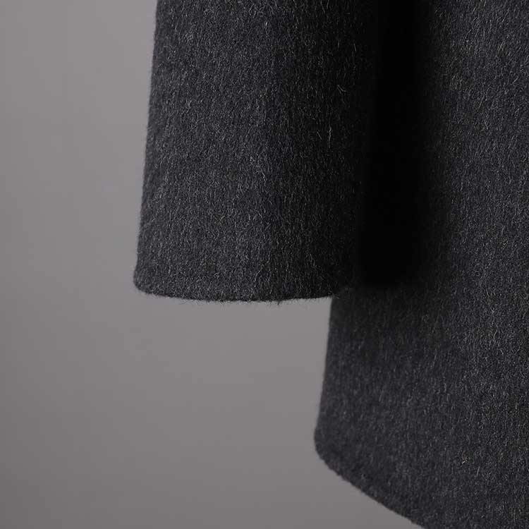 Double belted wool coat black with a stylish and modern design, perfect for winter layering