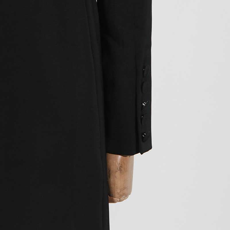 Elegant dressy black jacket for special occasions featuring sleek tailoring and stylish buttons