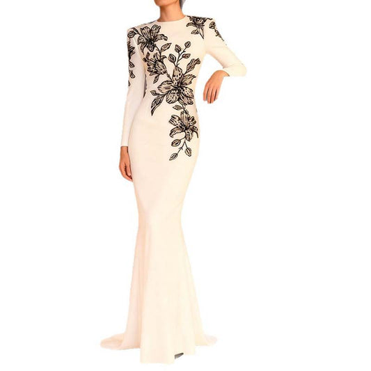 Elegant embellished evening gown for prom with floral design and long sleeves