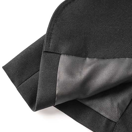 Detail of SD Dresscode black jacket fabric showcasing a professional women's black suit for events