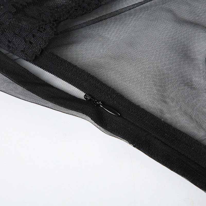 Close-up of a sexy mesh lace mini dress featuring a zipper and intricate lace detailing