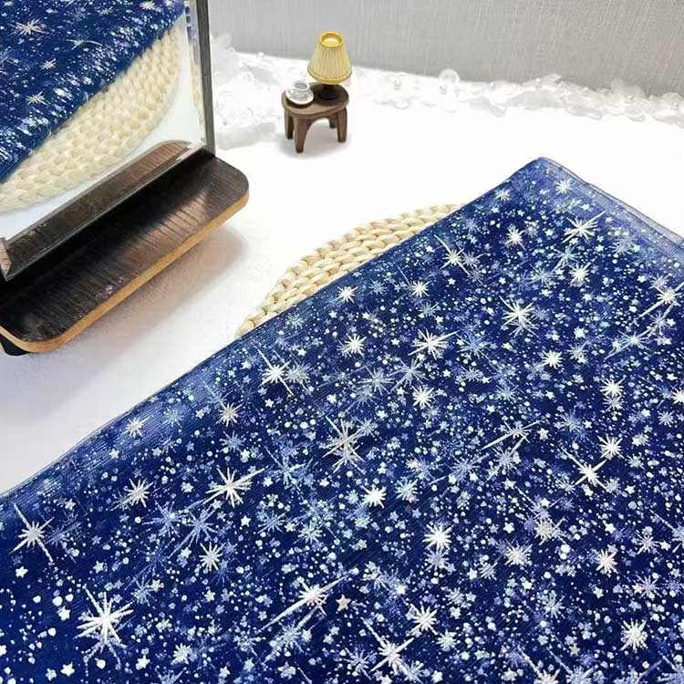 S&DCo. sparkly hooded robe for wedding featuring a starry design on a navy background