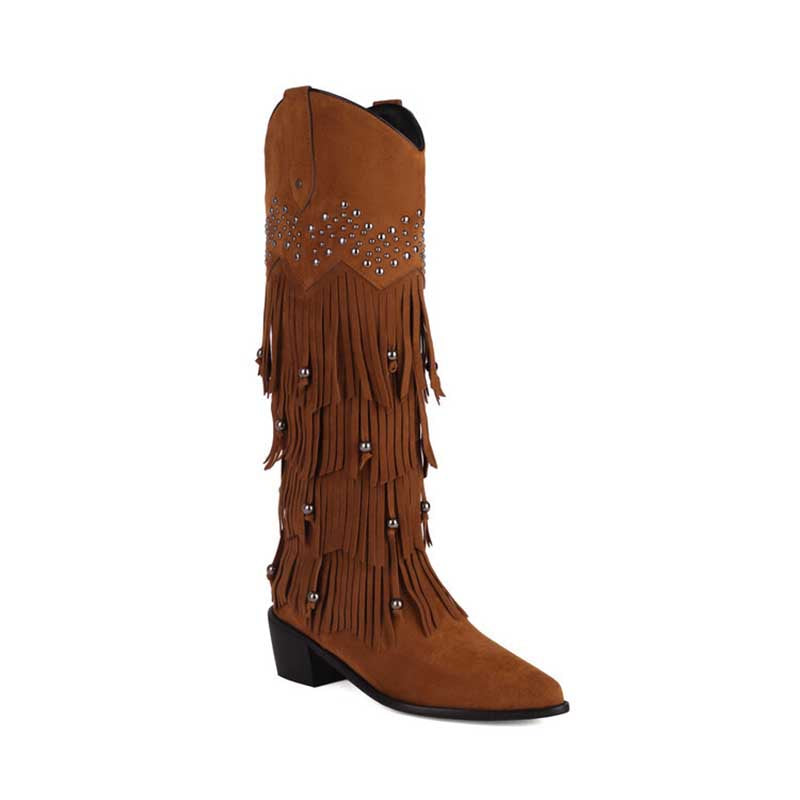 Vintage tassel cowgirl boots in brown with fringe and studded detailing for a stylish western look