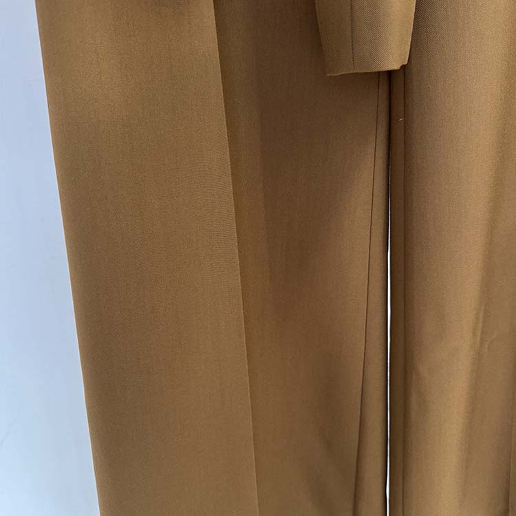 Close-up of SD Dresscode women's brown tailored pantsuit showcasing sleek fabric and precise stitching