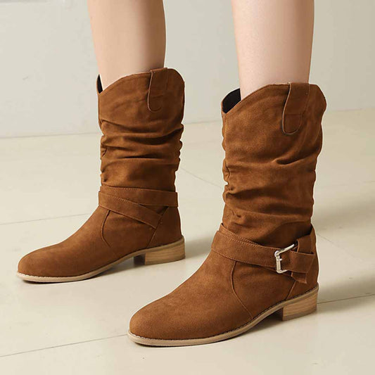 Stylish women's flat suede ankle boots in brown with slouched design and buckle detail for trendy outfits