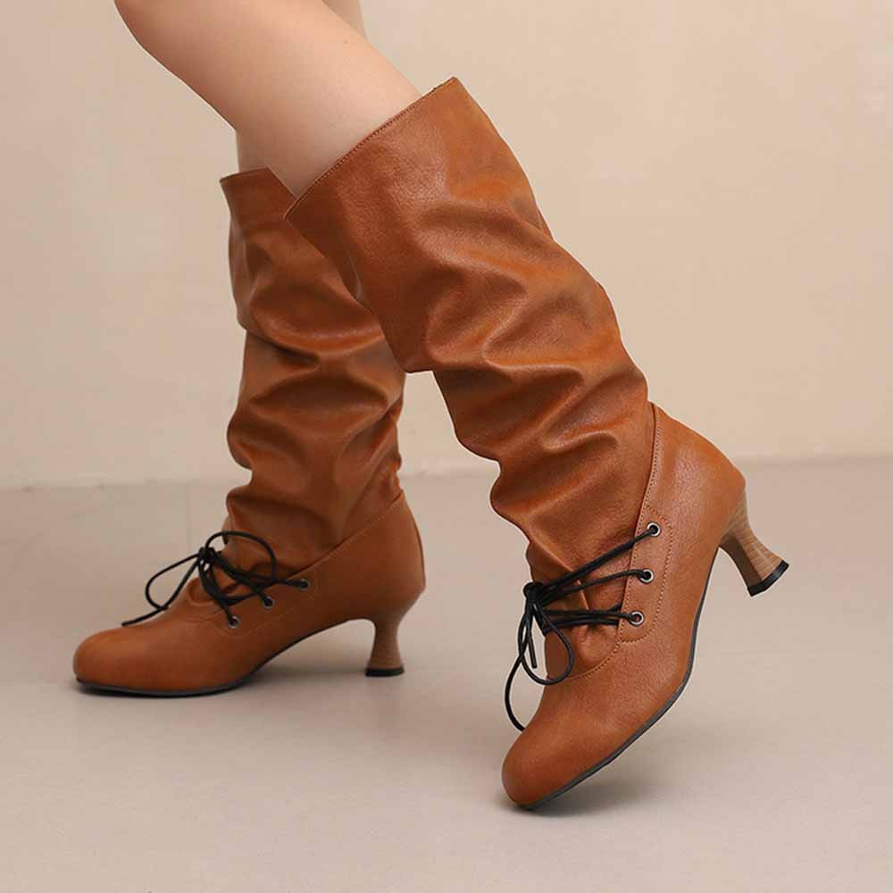 Brown women's lace-up high shaft boots with a stylish design and ankle support