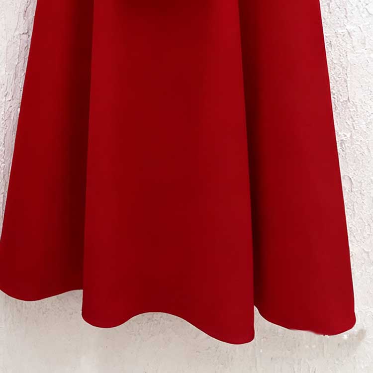 Elegant red women's two piece skirt suit with a flattering cut for stylish office wear