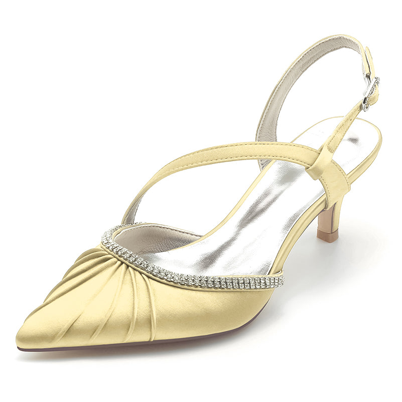 yellow high-heeled shoe with a decorative strap on a white background