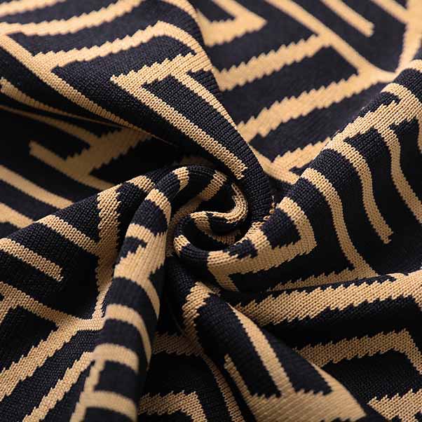 Women's long sleeve knitted minidress Black Yellow striped elegant dress