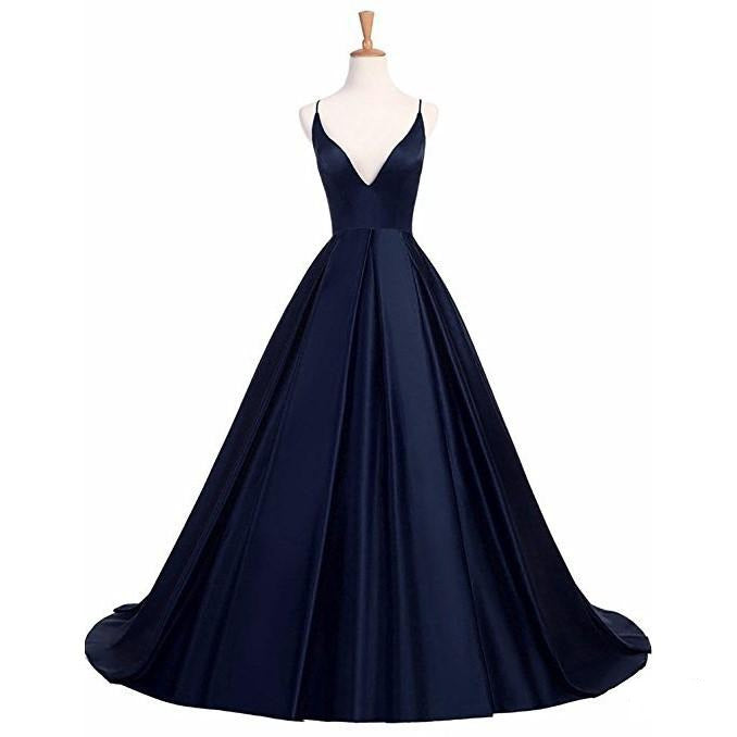 Navy blue elegant formal gown for prom with a deep V-neck and flowing skirt design