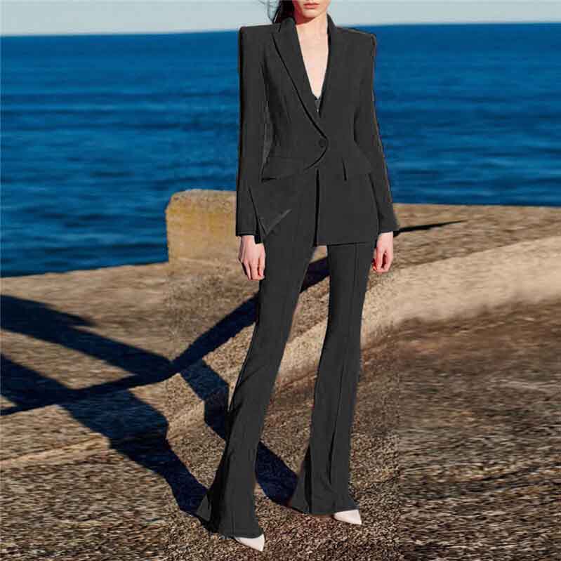 Elegant high waisted wedding pantsuit by Tucomosi, featuring a fitted blazer and stylish flared trousers