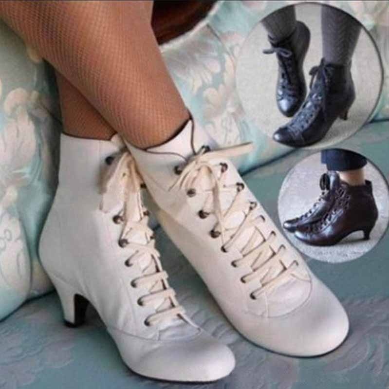 Vintage style wedding boots for women in white and black with lace-up design and elegant heels