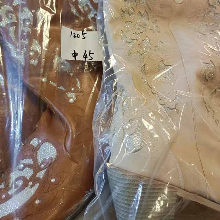 White glitter wedding boots featuring intricate designs perfect for bridal footwear