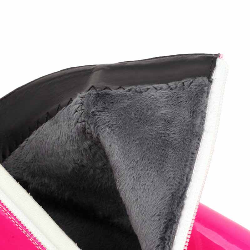 Interior view of women's block heel ankle boots featuring soft gray lining for comfort