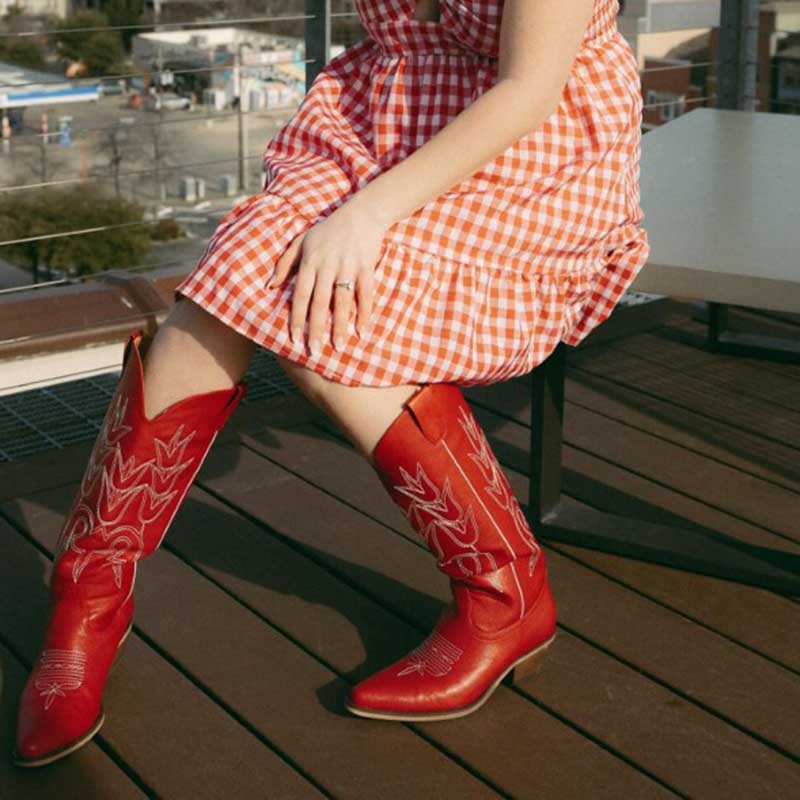 Creative stylish cowboy boots outfit ideas featuring a woman in a checkered dress and red cowboy boots