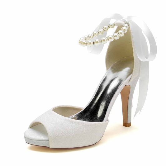 Elegant bridal shoes with pearls and ribbon perfect for weddings and special occasions