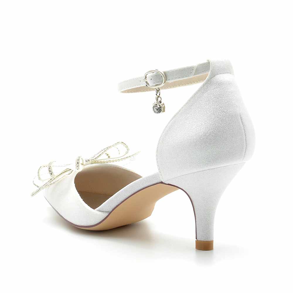 Elegant glitter bridal shoes low heel with a delicate bow and ankle strap for weddings