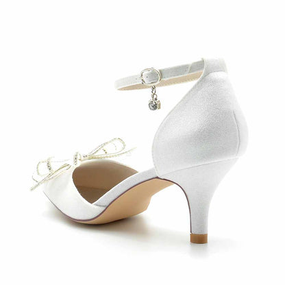 Elegant glitter bridal shoes low heel with a delicate bow and ankle strap for weddings