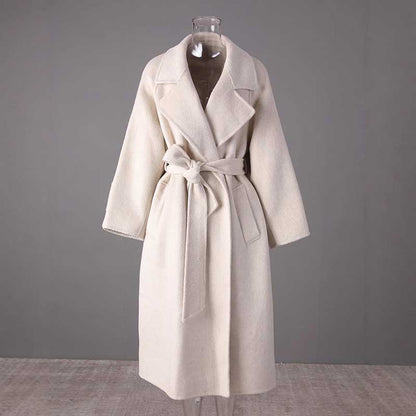 Elegant mid-length wool coat stylish comfort with a belted waist in soft cream color