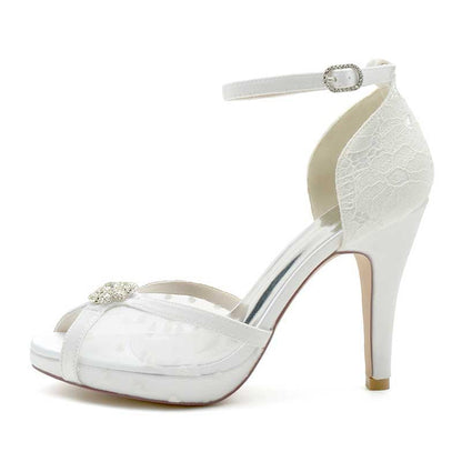 Elegant platform wedding shoes with lace and rhinestone, featuring an ankle strap and high heels