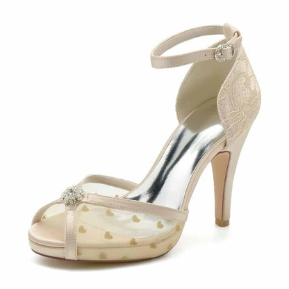 Wedding pumps with lace featuring a delicate design and sparkling embellishments