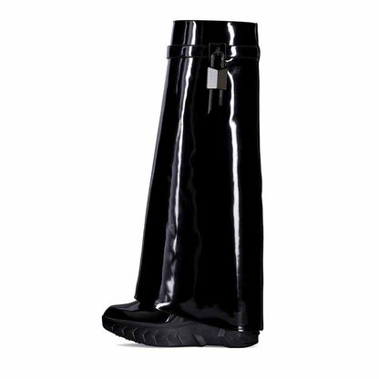 Shiny black women's padlock knee high boots with a stylish design and chunky sole