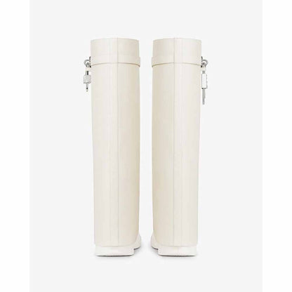 Women's padlock knee high boots in white with a sleek design and secure lock feature