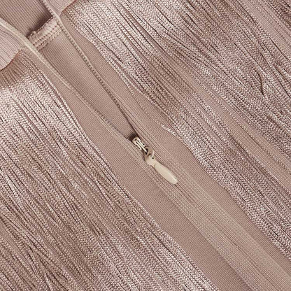 Close-up of elegant sleeveless tassel midi dress showcasing intricate fabric and zipper detail