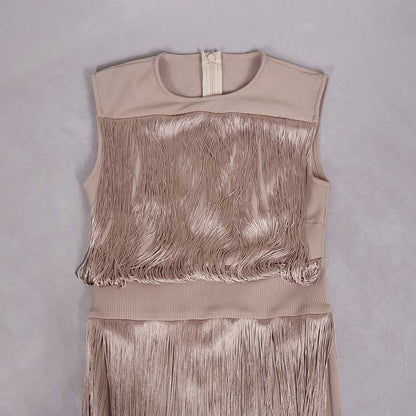 Elegant sleeveless tassel midi dress in blush with a stylish fringe design for trendy fashion.