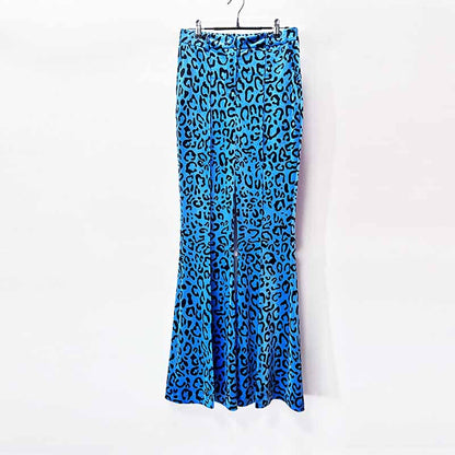 Women's leopard print velvet pantsuit in vibrant blue with flattering flared design