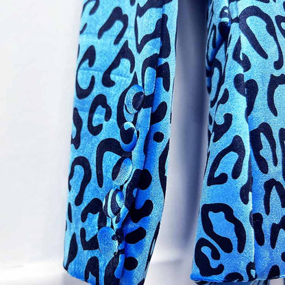 Close-up of women's leopard print velvet pantsuit featuring blue and black animal print pattern