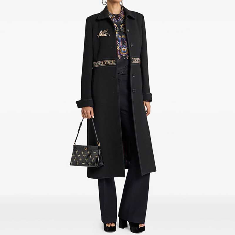 Elegant women's winter wool coat featuring a stylish embroidery and a classic design for cold weather.