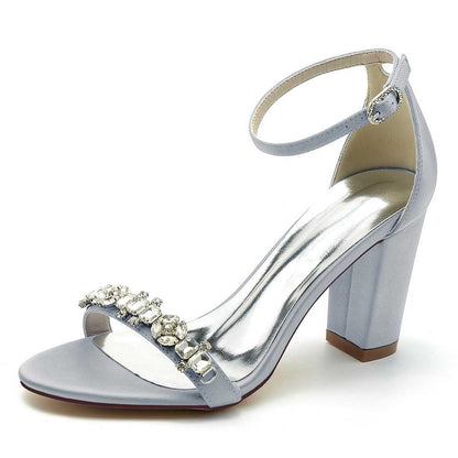 S&DCo. Elegant blue ankle strap dress sandals for weddings with jeweled embellishments