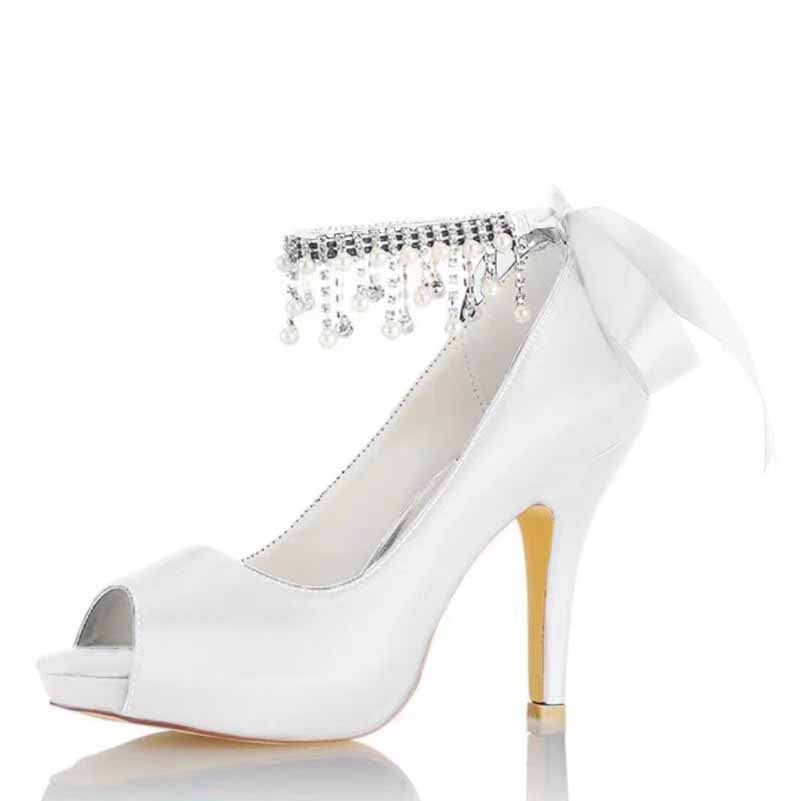 Elegant white beaded peep toe stilettos for women with a decorative ankle strap and high heel