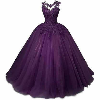 Purple beaded quinceanera dresses with a voluminous tulle skirt and elegant lace detailing