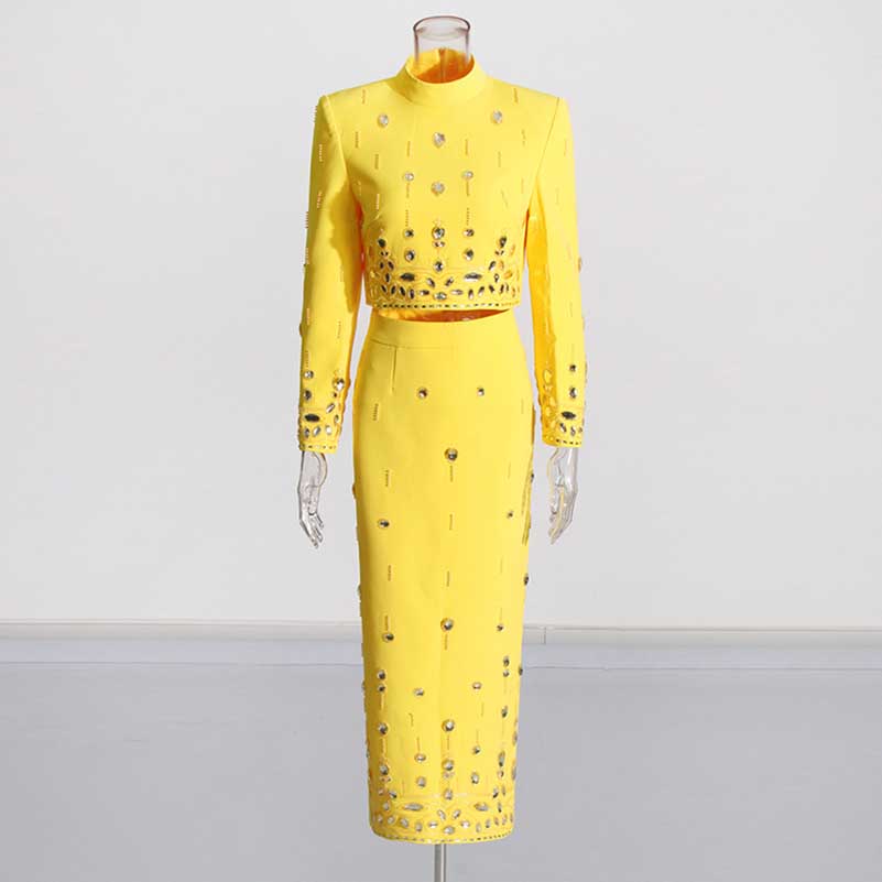 Bright yellow beaded women's skirt suit with long sleeves and elegant design for formal occasions