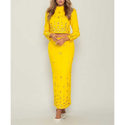 Beaded women's skirt suit in vibrant yellow with long sleeves and elegant design