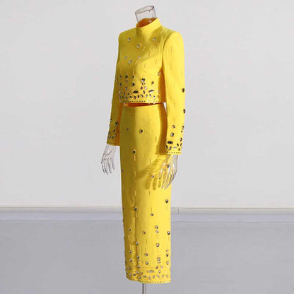 Bright yellow beaded women's skirt suit with long sleeves and stylish silhouette for formal occasions