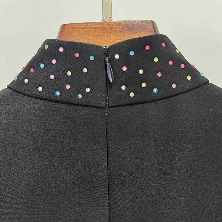 Back view of a black beaded crystal mini dress featuring colorful bead embellishments on the collar