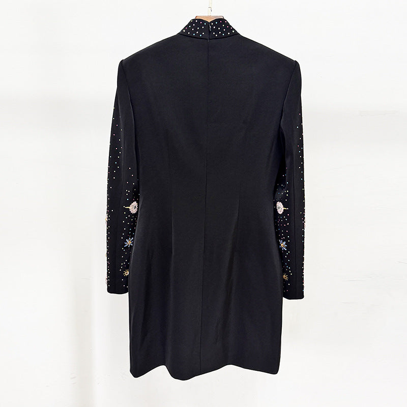 Back view of a stylish black beaded crystal mini dress with embellished sleeves and a sleek silhouette