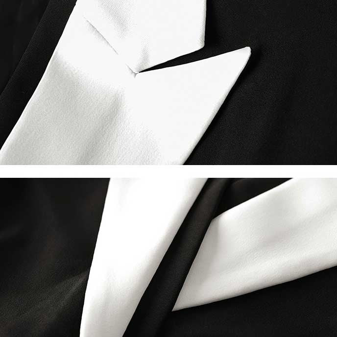 Stylish black blazer with white collar for women featuring elegant cuffs