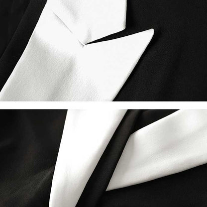 Stylish black blazer with white collar for women featuring elegant cuffs