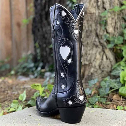 Elegant black embroidered cowgirl boots for women with heart and star designs on the shaft
