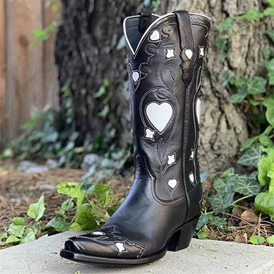 Black embroidered cowgirl boots for women featuring intricate heart designs and stylish western flair