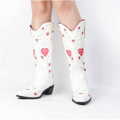 White cowgirl boots with red heart designs, stylish and unique for women